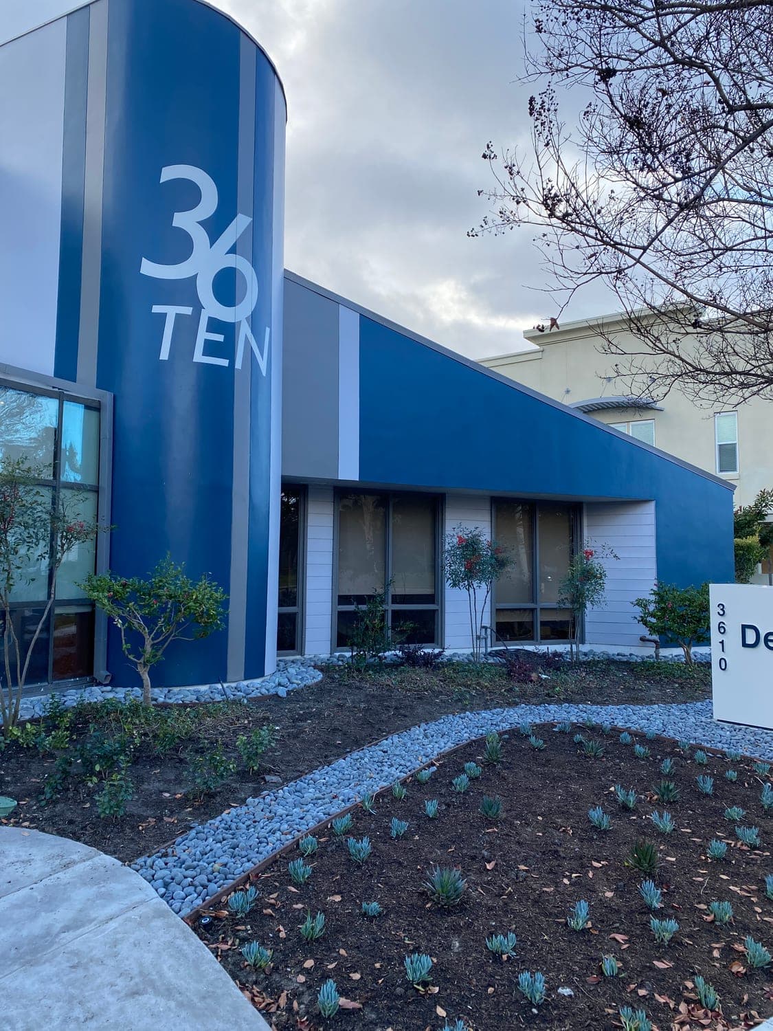 Custom monument sign and entry landscaping at 36 TEN Dental Arts Plaza
