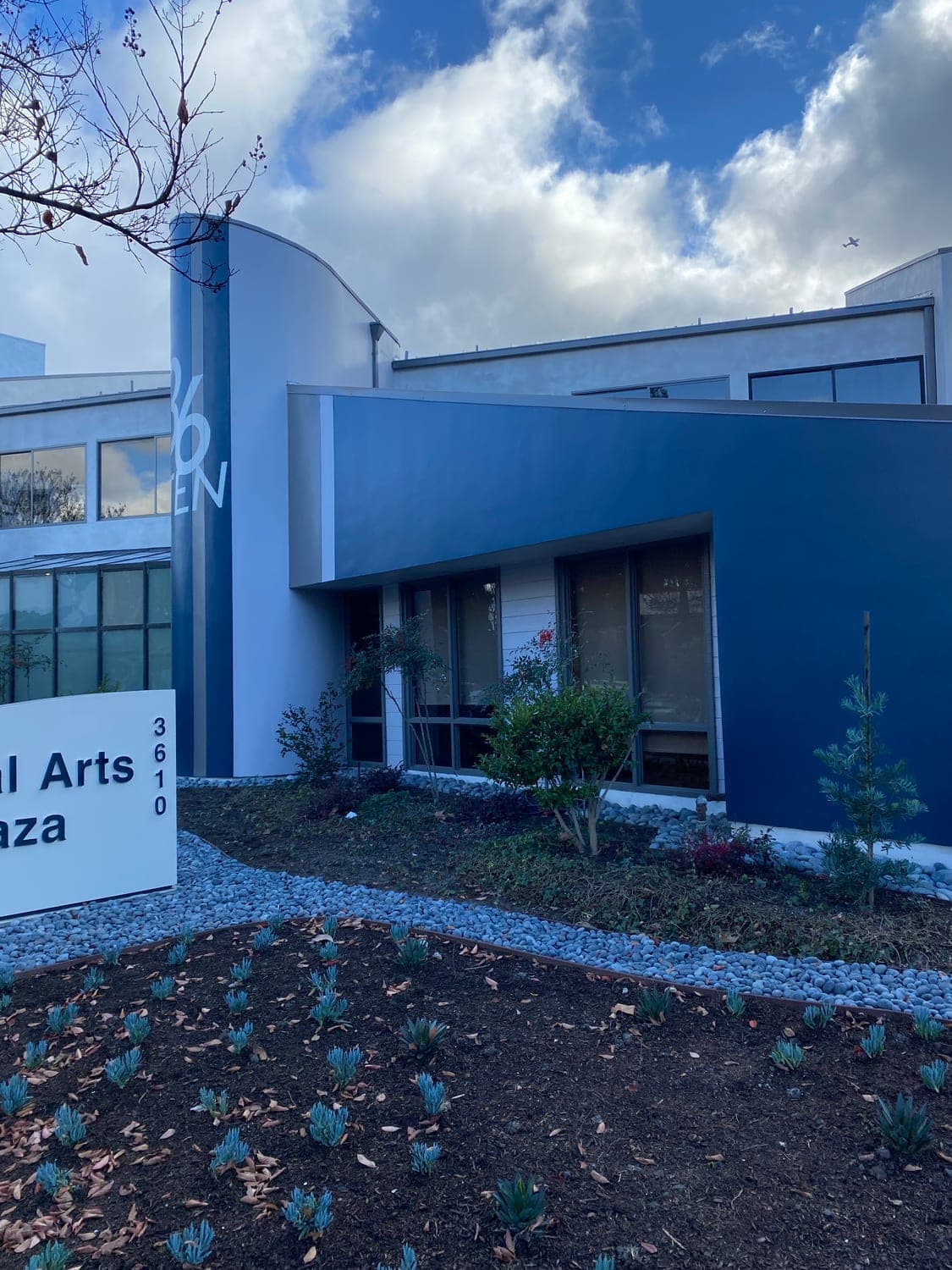 Tenant entry with Dental Arts Plaza signage at 36 TEN